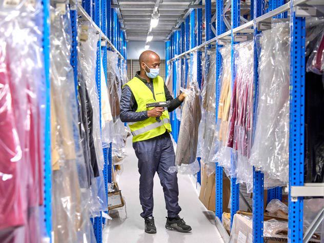 View a worker in an e-commerce warehouse