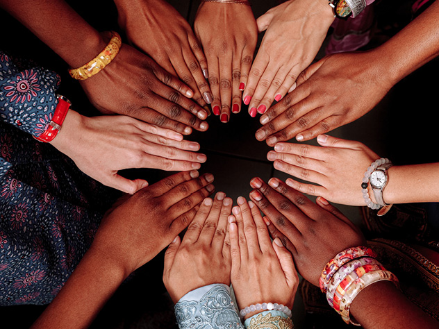 Hands touching and forming a circle